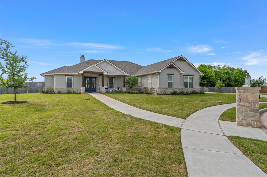 624 Lindsay Lane Robinson, TX 76706 - Photo 4 of 39 a front view of a house with a yard