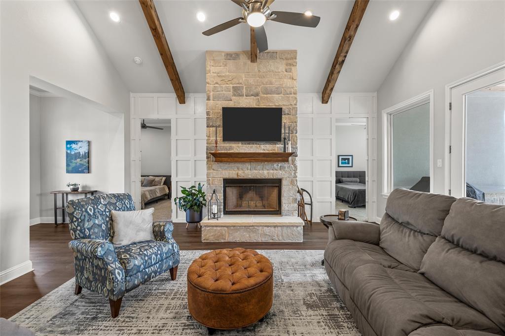 624 Lindsay Lane Robinson, TX 76706 - Photo 8 of 39 a living room with furniture and a fireplace