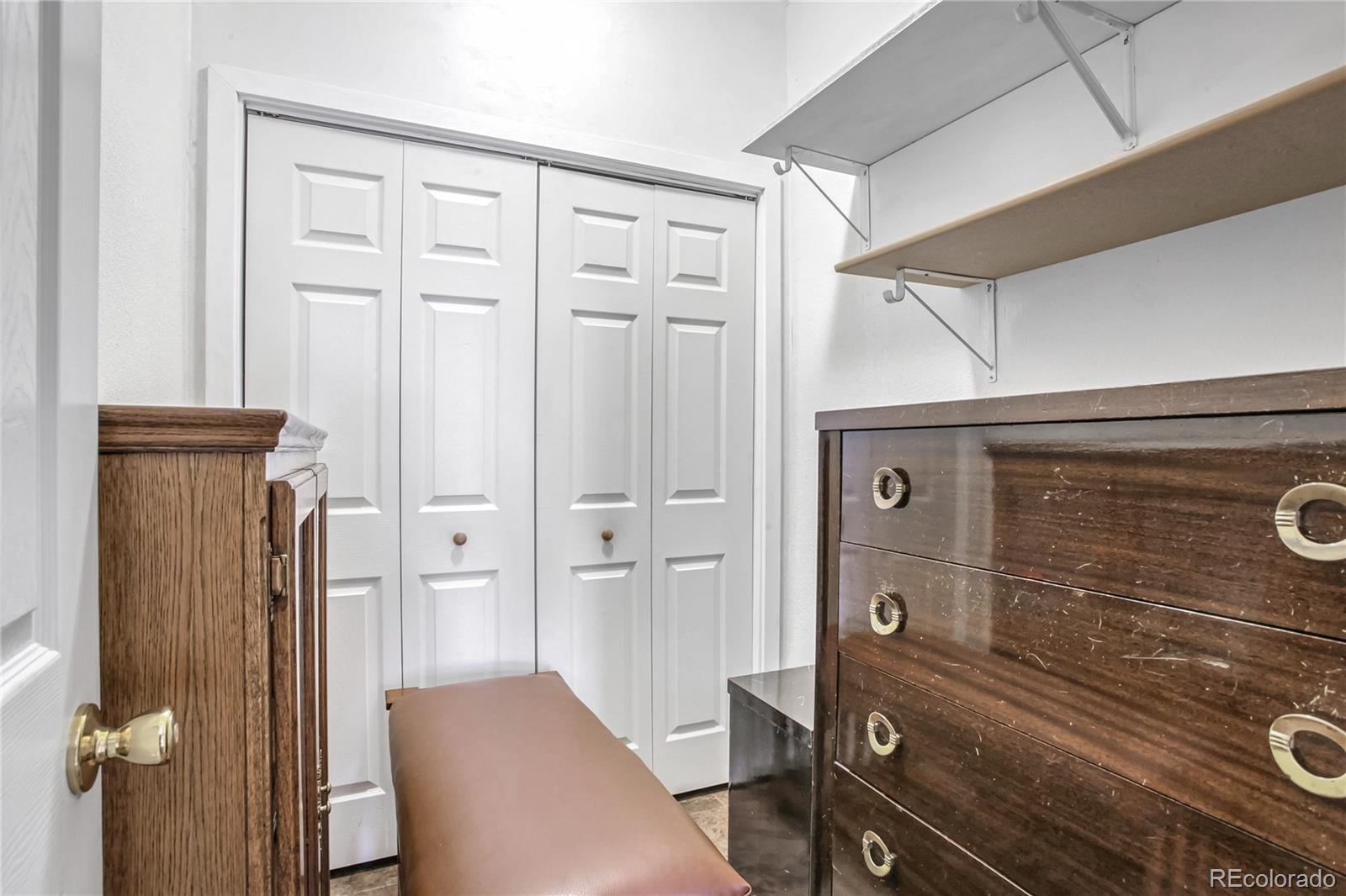 10106 North Grove Loop, Unit A Westminster, CO 80031 - Photo 19 of 33 a view of a hallway with closet
