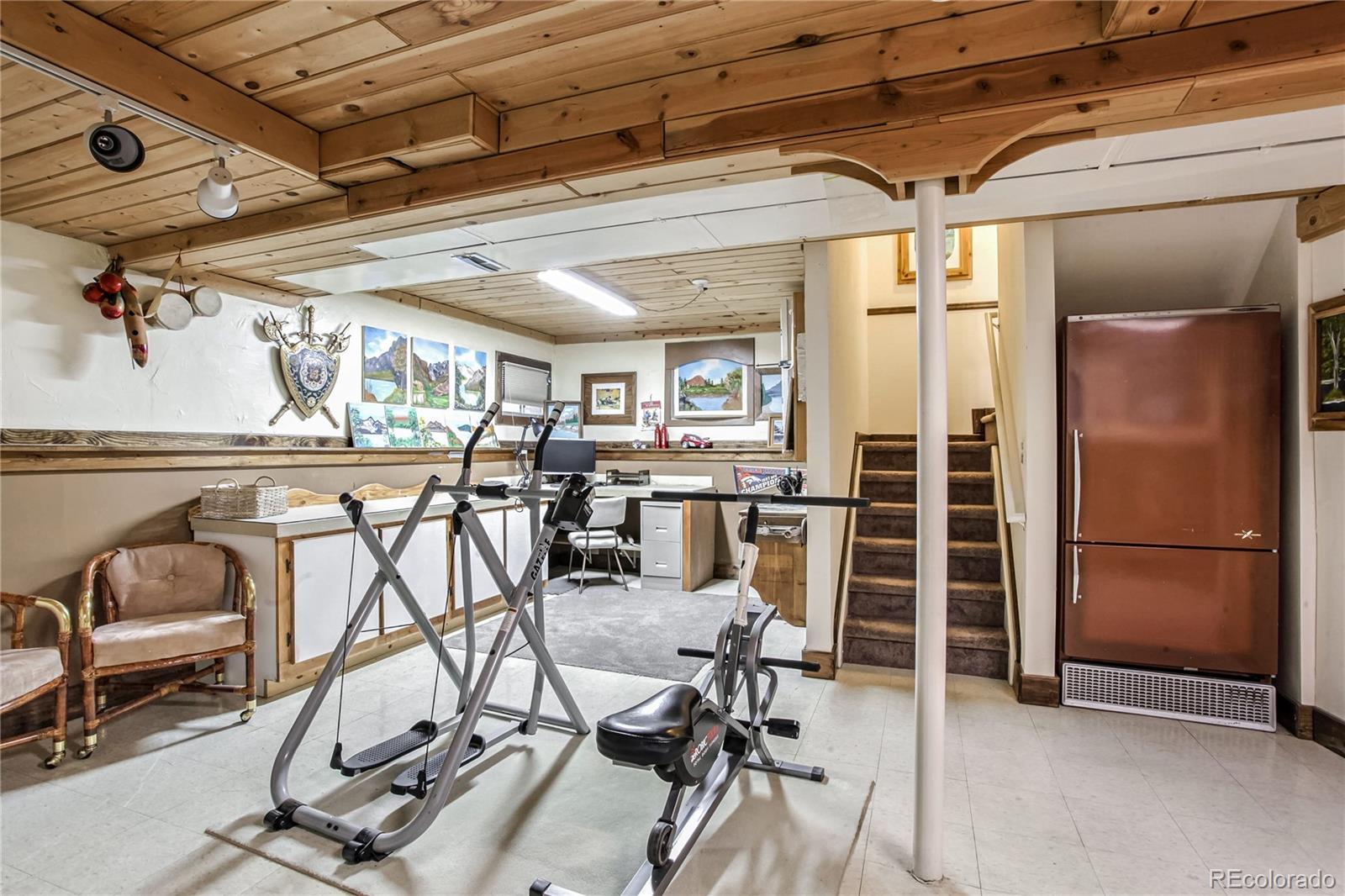 10106 North Grove Loop, Unit A Westminster, CO 80031 - Photo 26 of 33 a room with table chairs and white stainless steel appliances