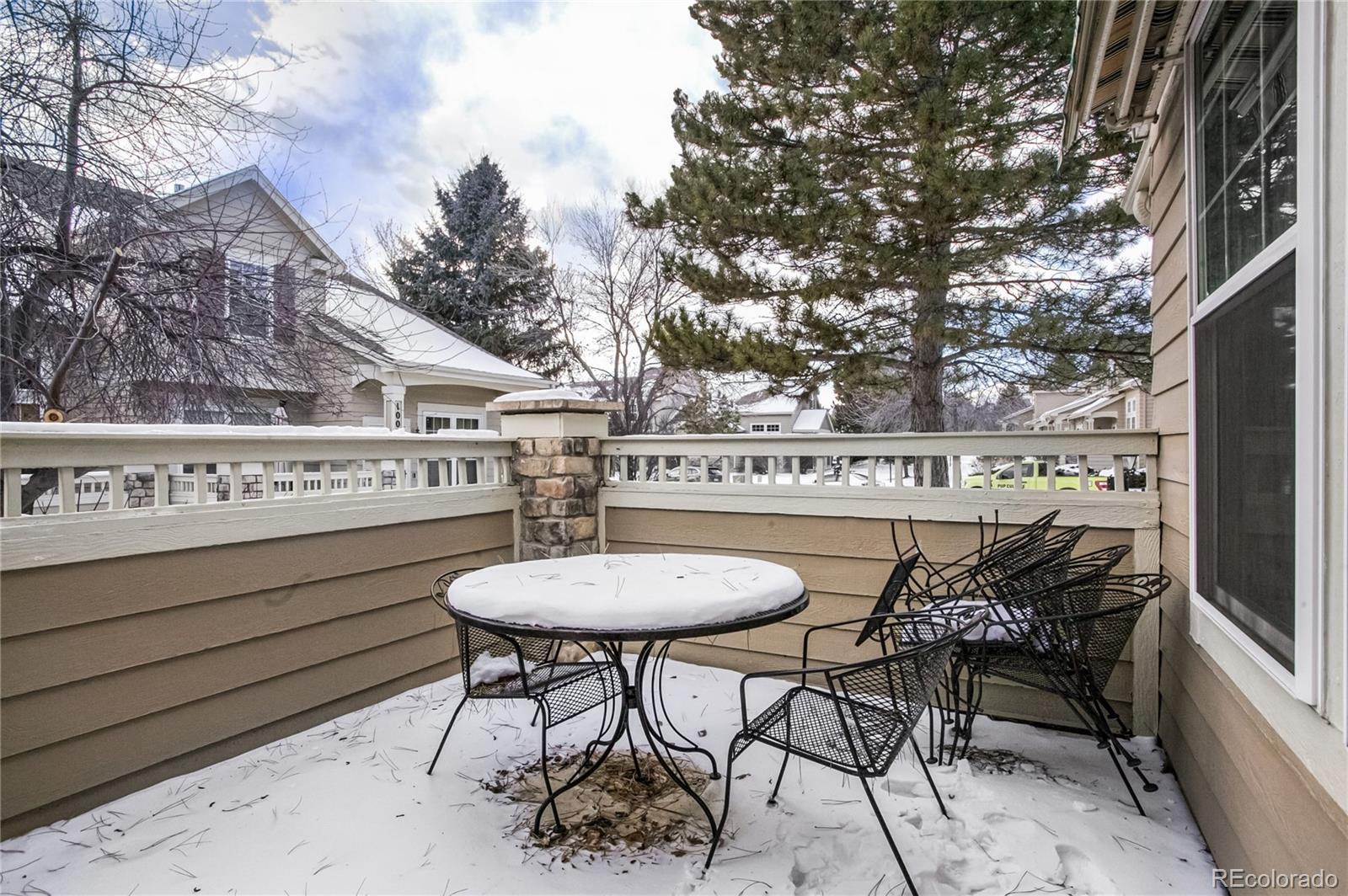 10106 North Grove Loop, Unit A Westminster, CO 80031 - Photo 30 of 33 a view of a chairs and table in a balcony