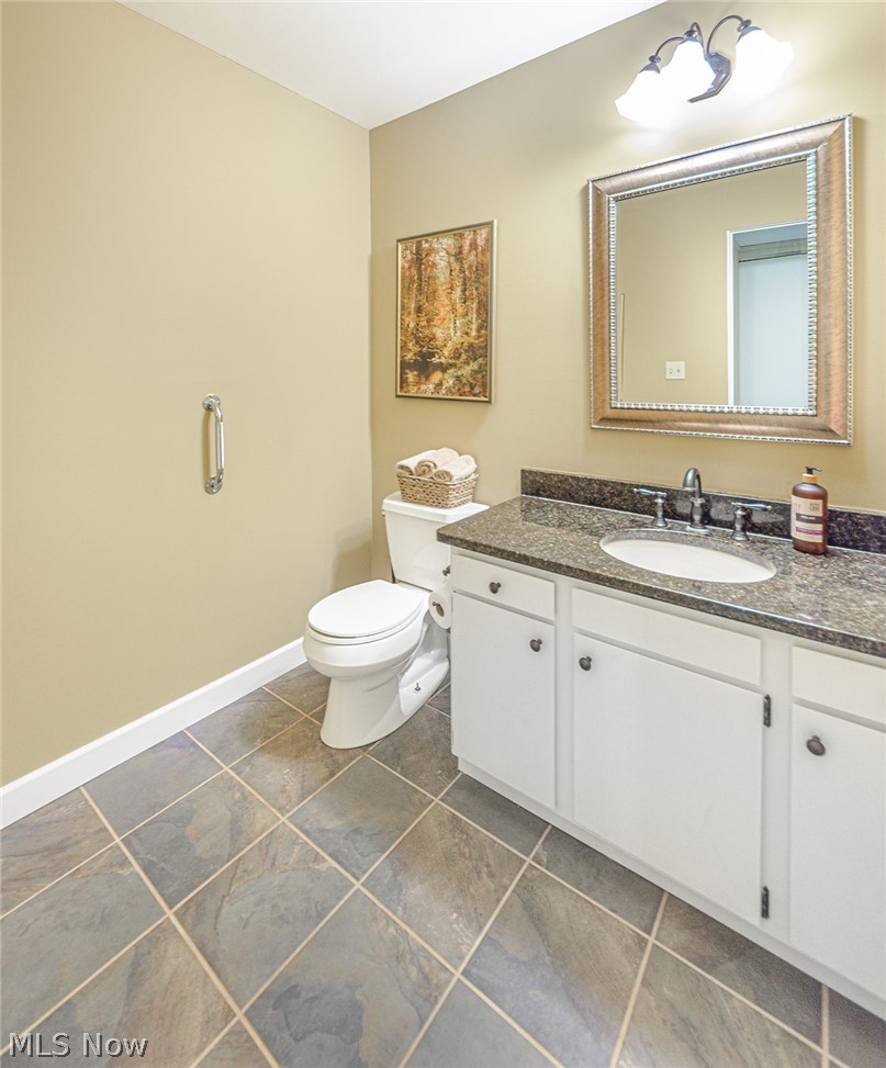 836 Hampton Ridge Drive Akron, OH 44313 - Photo 12 of 33 Main floor half bath.