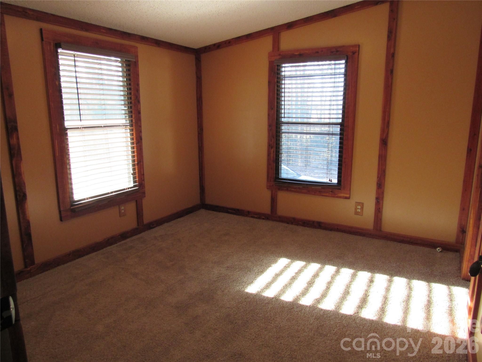 6825 Nance-Tarlton Road Marshville, NC 28103 - Photo 24 of 34 a view of an empty room with a window