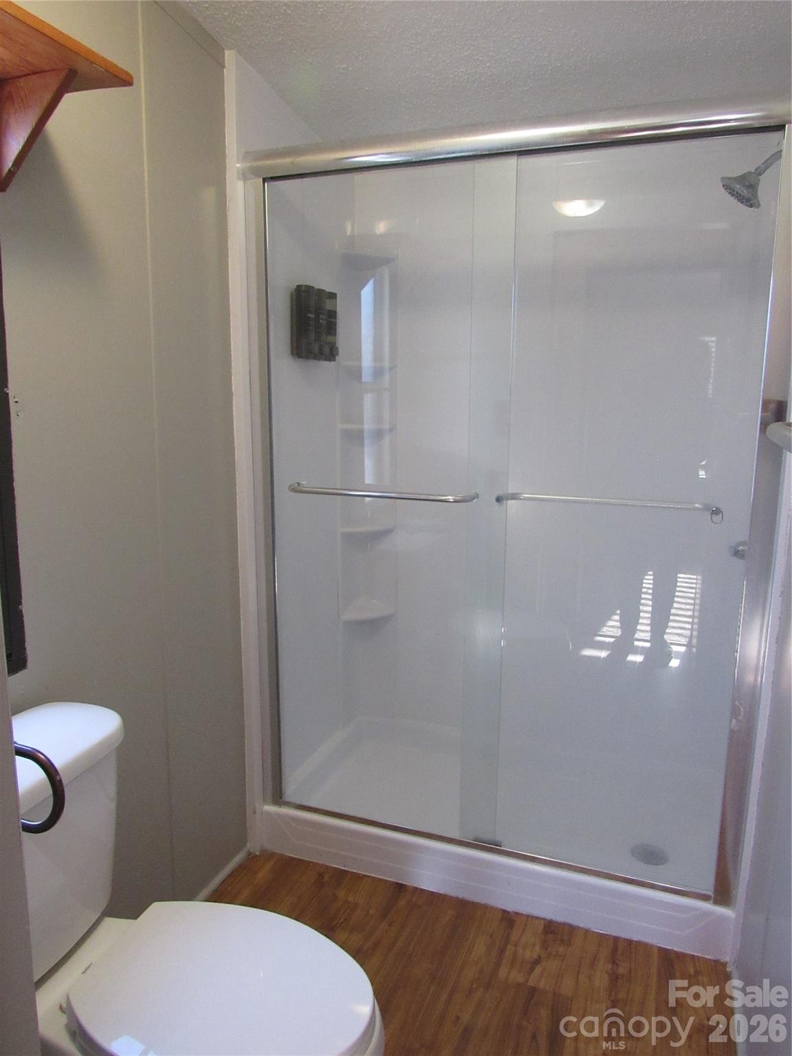 6825 Nance-Tarlton Road Marshville, NC 28103 - Photo 25 of 34 a white toilet sitting next to a bathroom sink