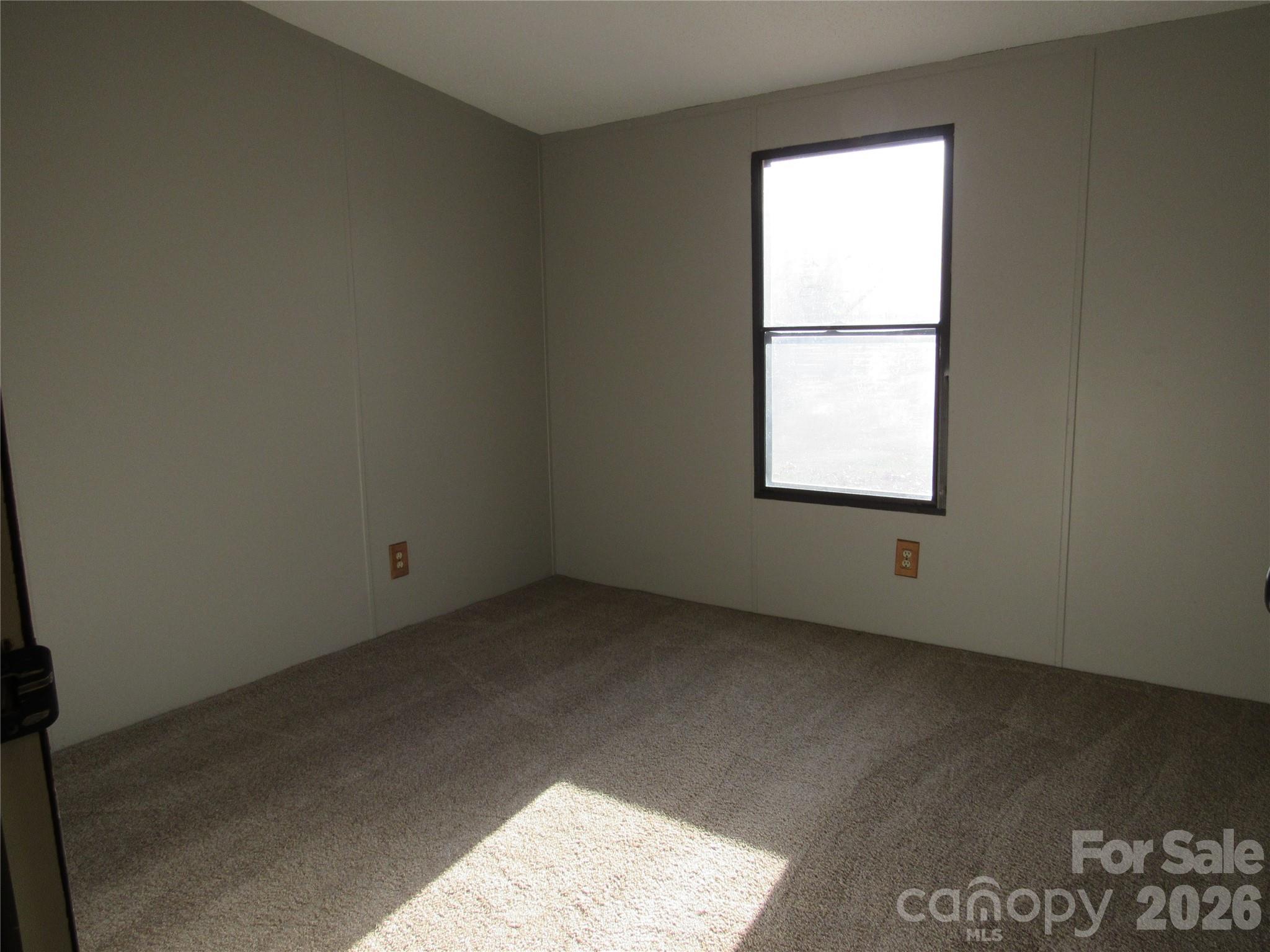 6825 Nance-Tarlton Road Marshville, NC 28103 - Photo 29 of 34 an empty room with a window