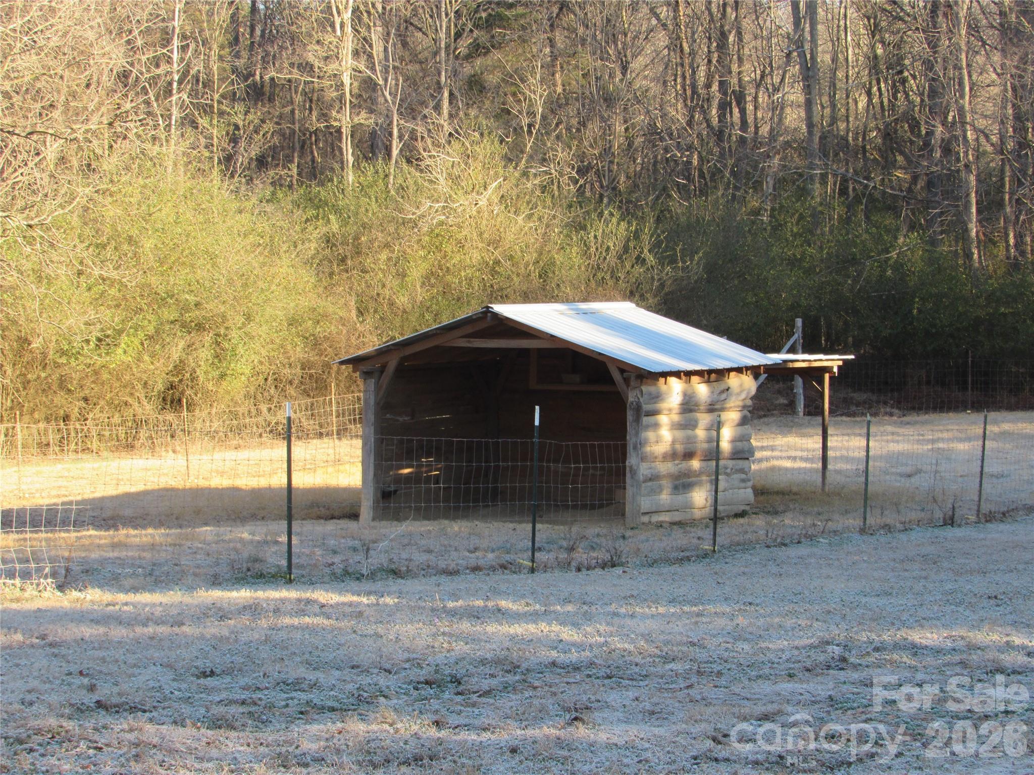 6825 Nance-Tarlton Road Marshville, NC 28103 - Photo 8 of 34 a view of a entrance gate of the house