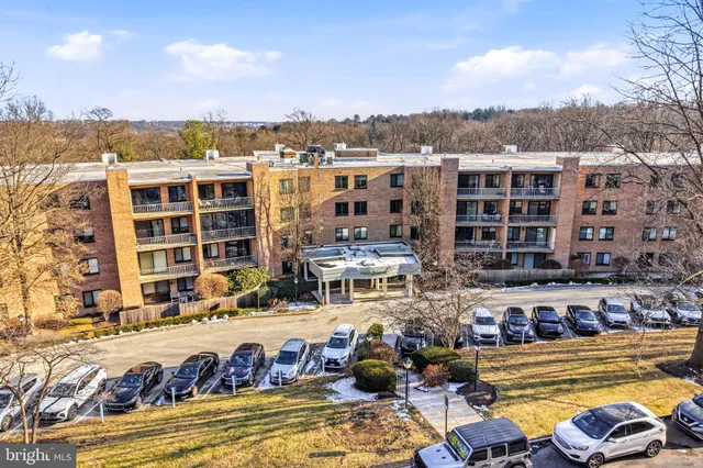 a view of a water fountain and a terrace