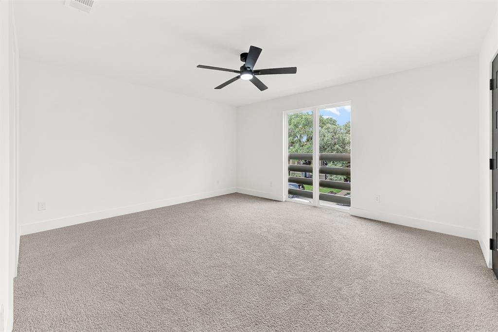 9471 Timberleaf Drive Dallas, TX 75243 - Photo 28 of 39 Spacious room with light gray carpet flooring and white walls