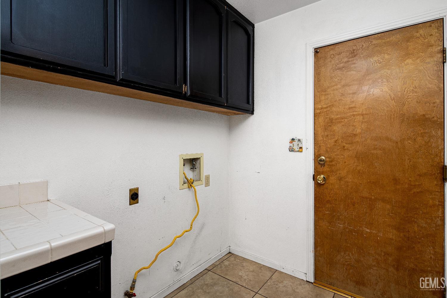 Undisclosed Address Bakersfield, CA 93313 - Photo 9 of 17 a bathroom with a sink and a shower