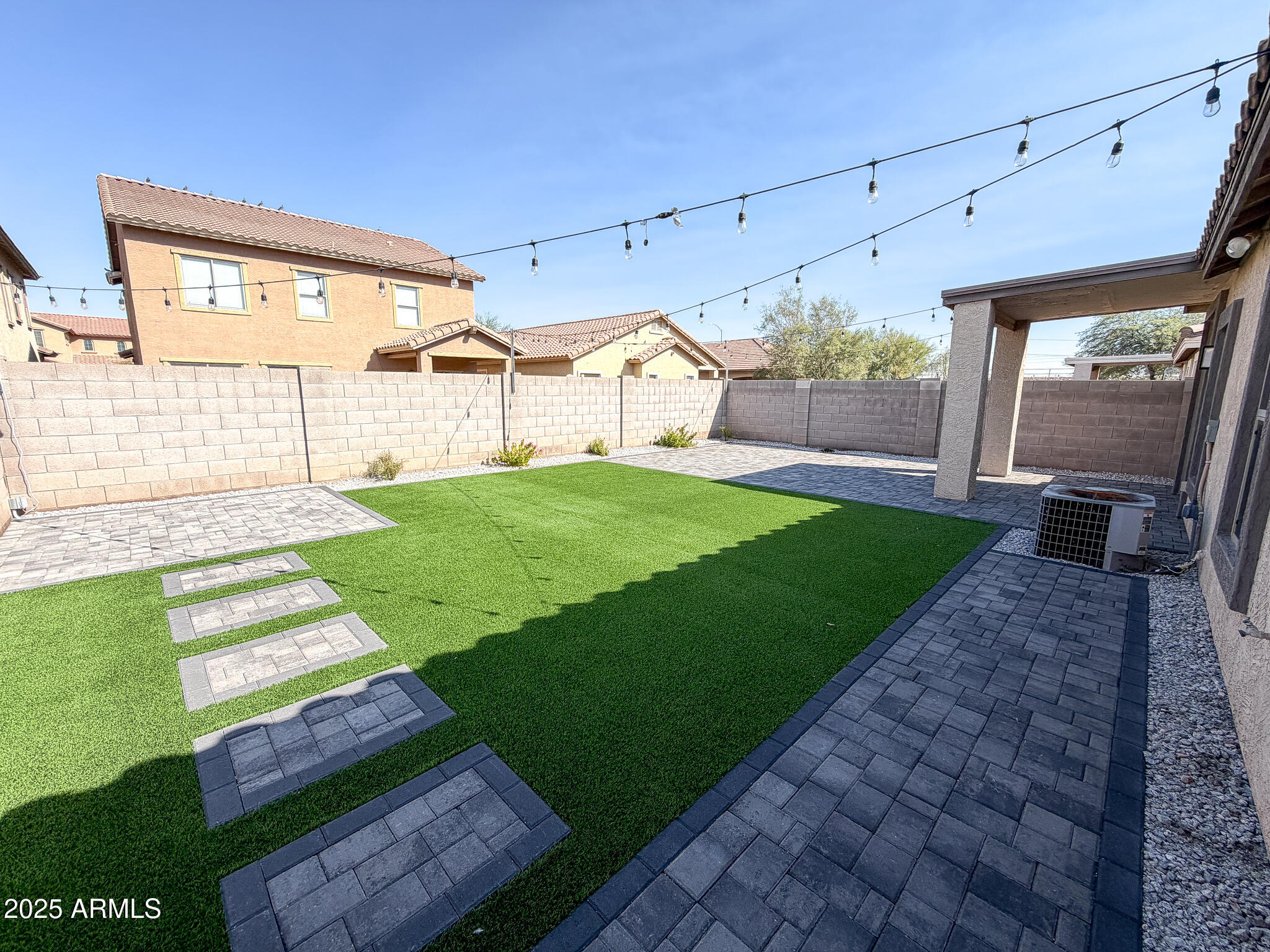 982 East Doris Street Avondale, AZ 85323 - Photo 16 of 17 a view of a backyard with a garden and plants
