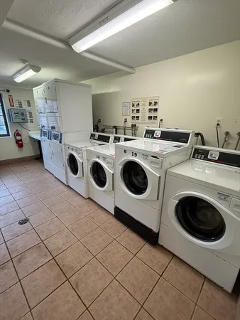 a view of street with parked cars