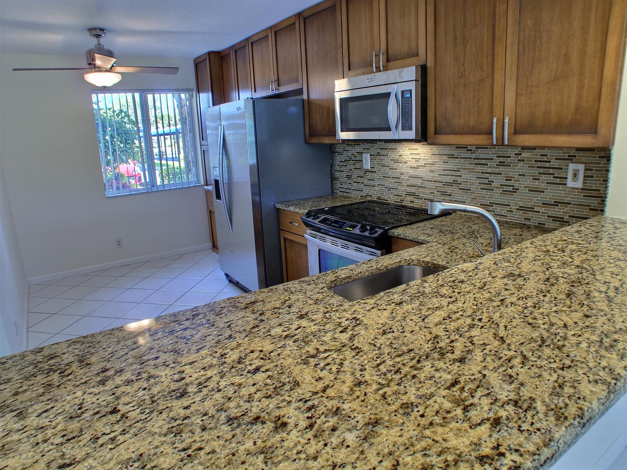 420 Northwest 67th Street, Unit K106 Boca Raton, FL 33487 - Photo 4 of 19 exposio_11745094