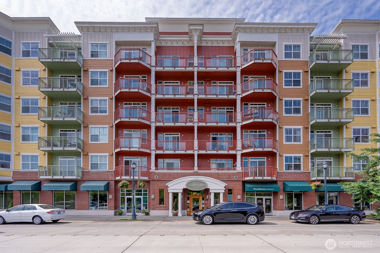 16141 Cleveland Street, Unit 412 Redmond, WA 98052 - Photo 1 of 31 a front view of a building with many windows