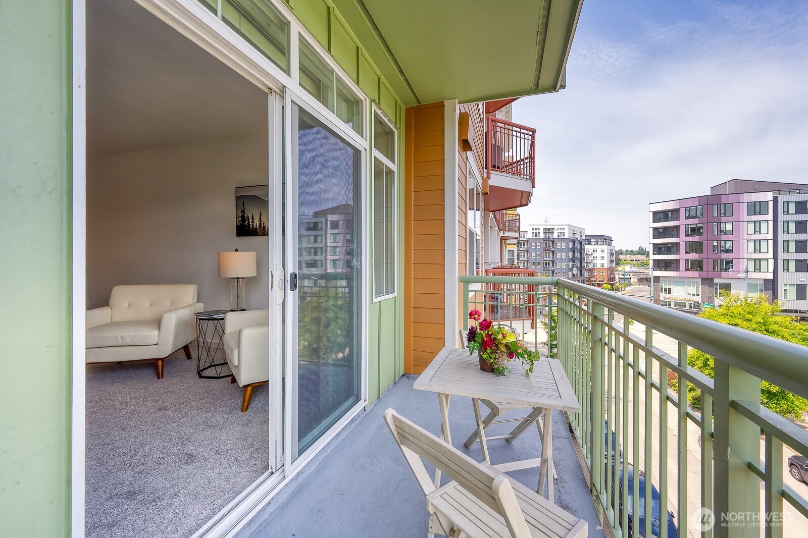 16141 Cleveland Street, Unit 412 Redmond, WA 98052 - Photo 15 of 31 a balcony view with a seating space