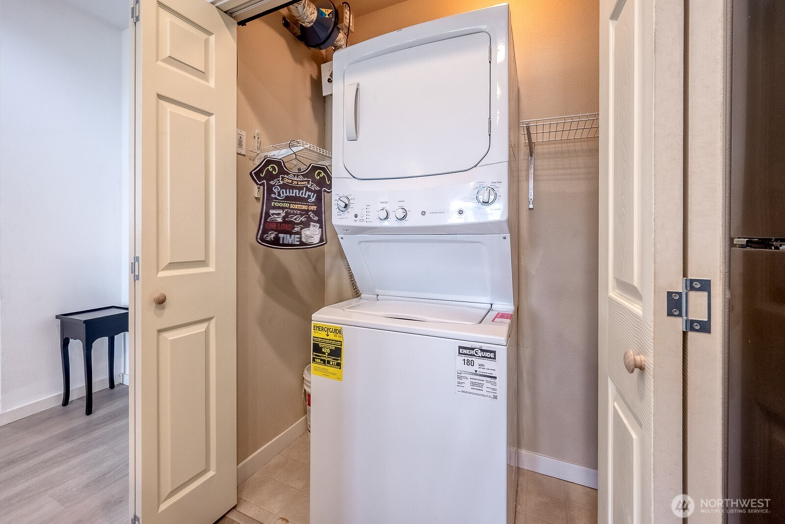 16141 Cleveland Street, Unit 412 Redmond, WA 98052 - Photo 28 of 31 a utility room with dryer and washer