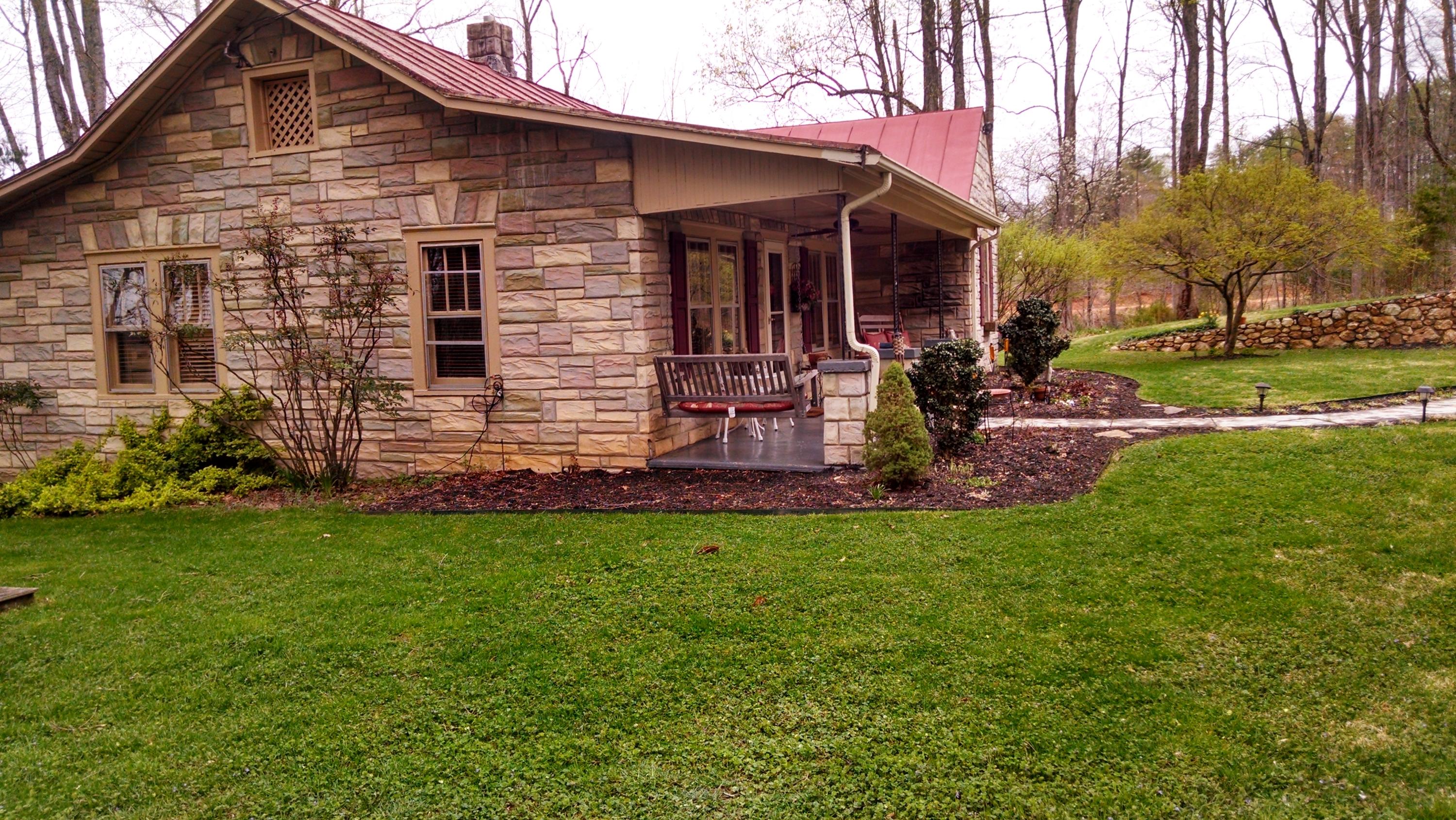 886 Custers Ridge Road Boones Mill, VA 24065 - Photo 2 of 11 a view of a house with backyard