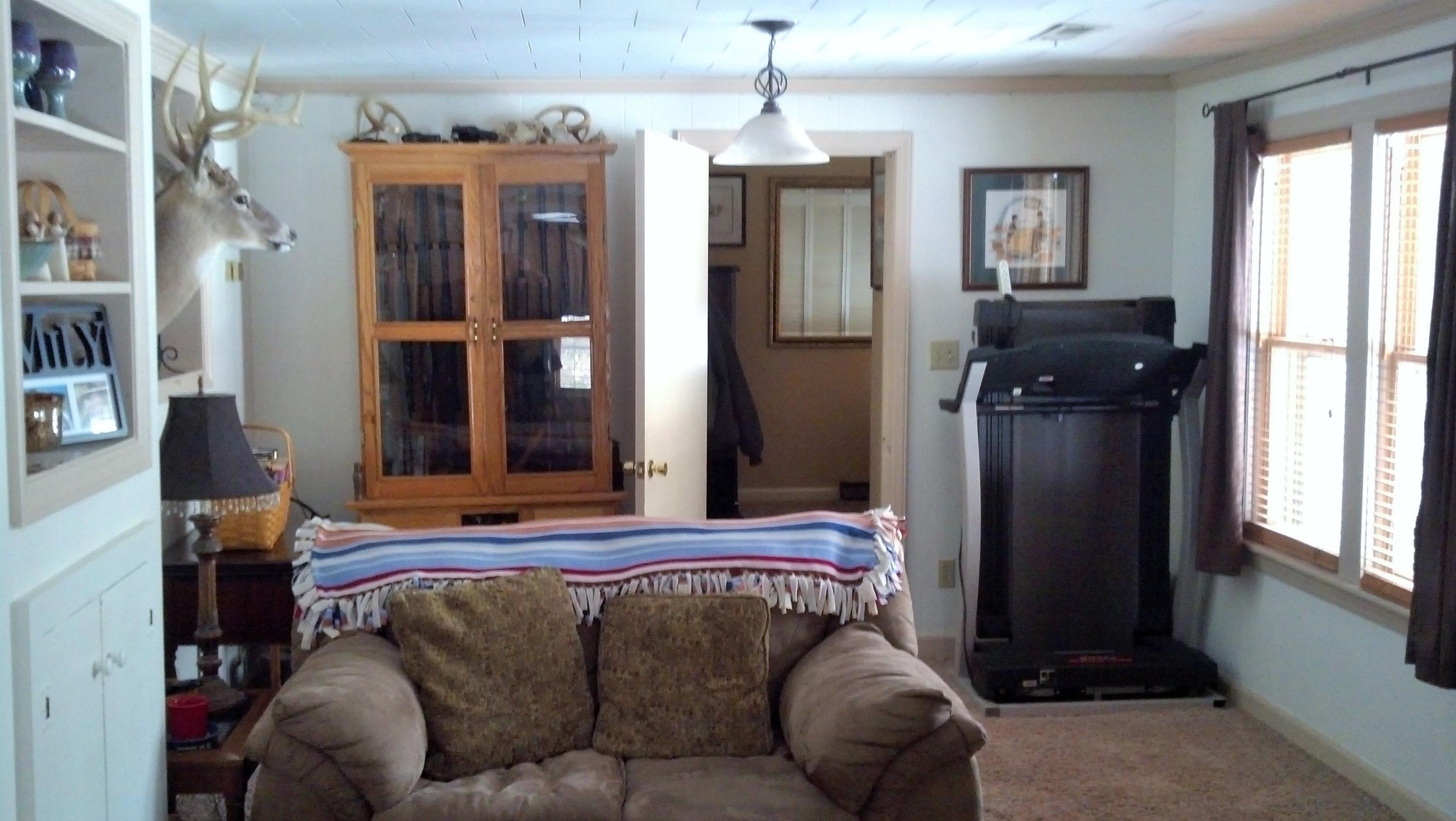 886 Custers Ridge Road Boones Mill, VA 24065 - Photo 9 of 11 a living room with furniture and a window