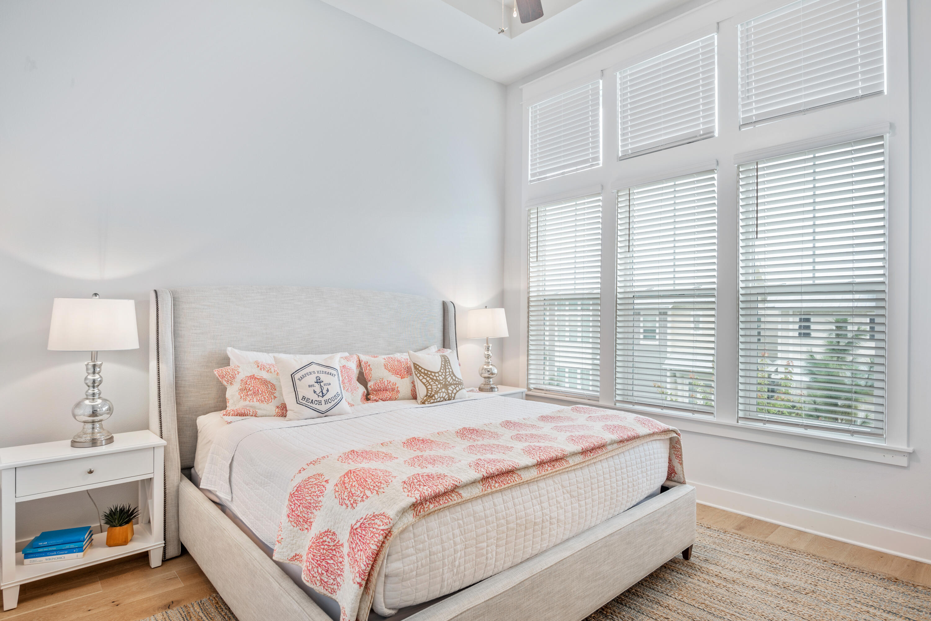 296 Milestone Dr Inlet Beach, Unit B Inlet Beach, FL 32461 - Photo 11 of 47 a bedroom with a bed and a window