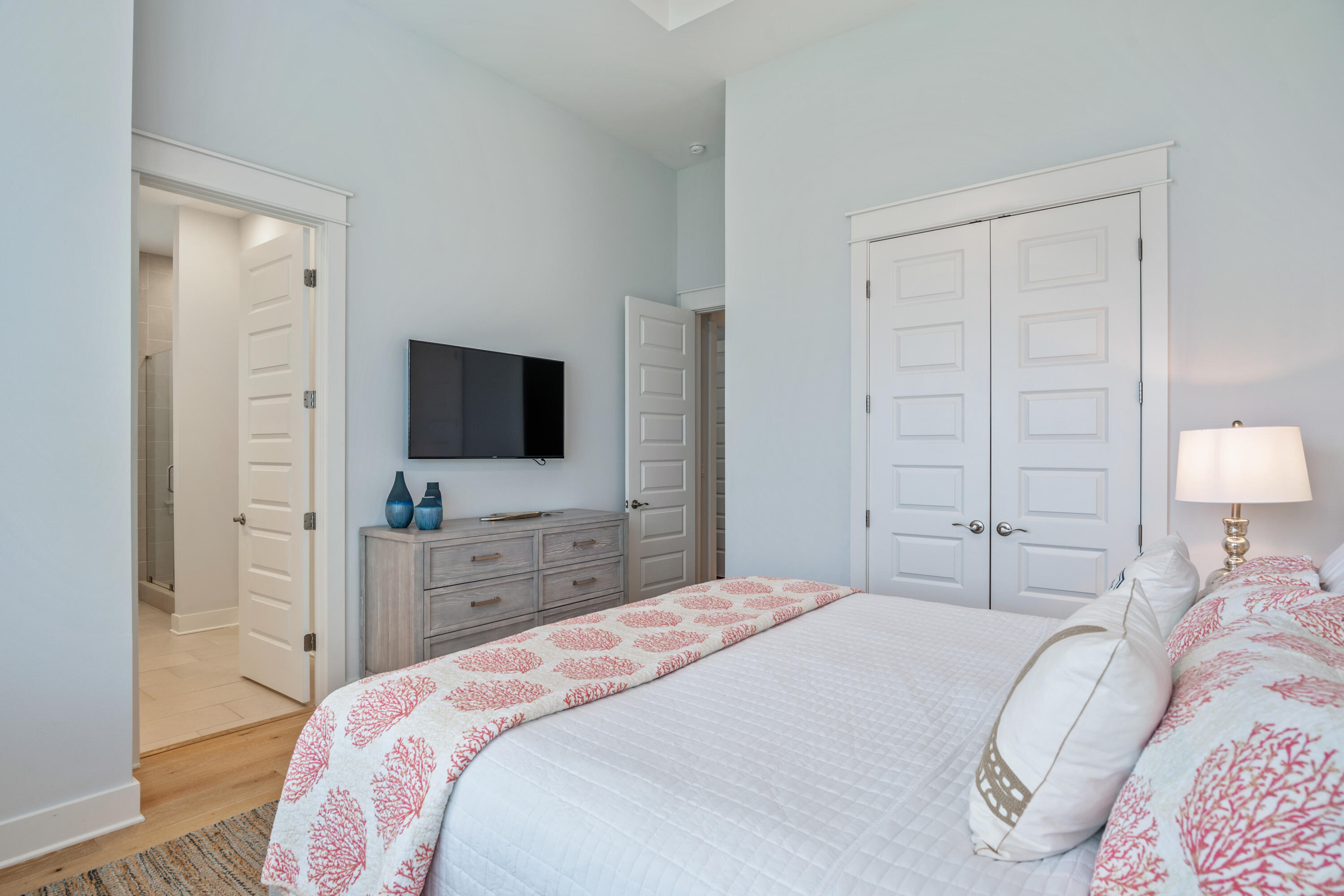 296 Milestone Dr Inlet Beach, Unit B Inlet Beach, FL 32461 - Photo 12 of 47 a bedroom with a bed and a flat screen tv