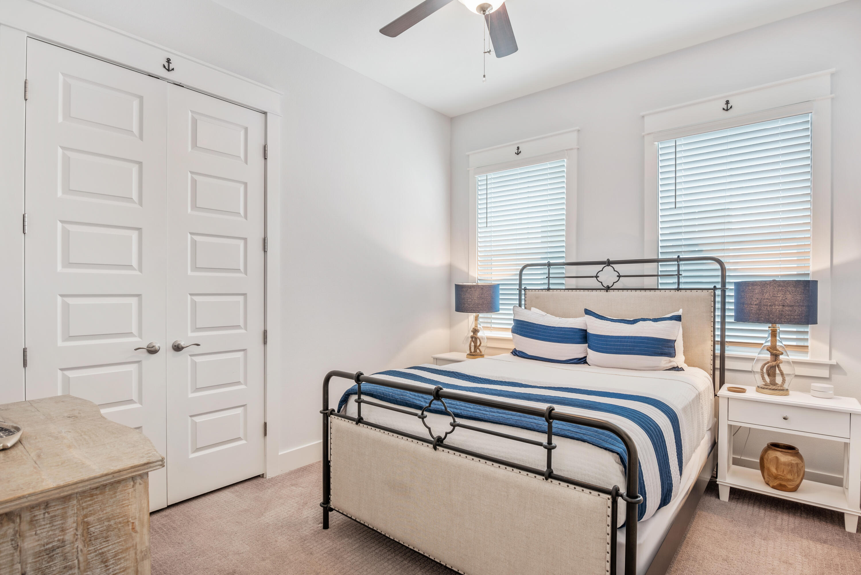 296 Milestone Dr Inlet Beach, Unit B Inlet Beach, FL 32461 - Photo 16 of 47 a bedroom with a bed and a window