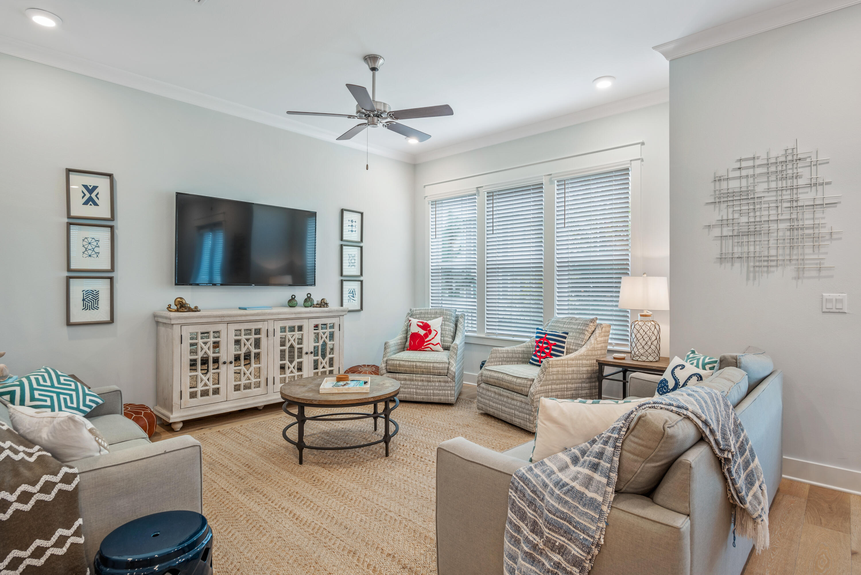 296 Milestone Dr Inlet Beach, Unit B Inlet Beach, FL 32461 - Photo 2 of 47 a living room with furniture and a flat screen tv
