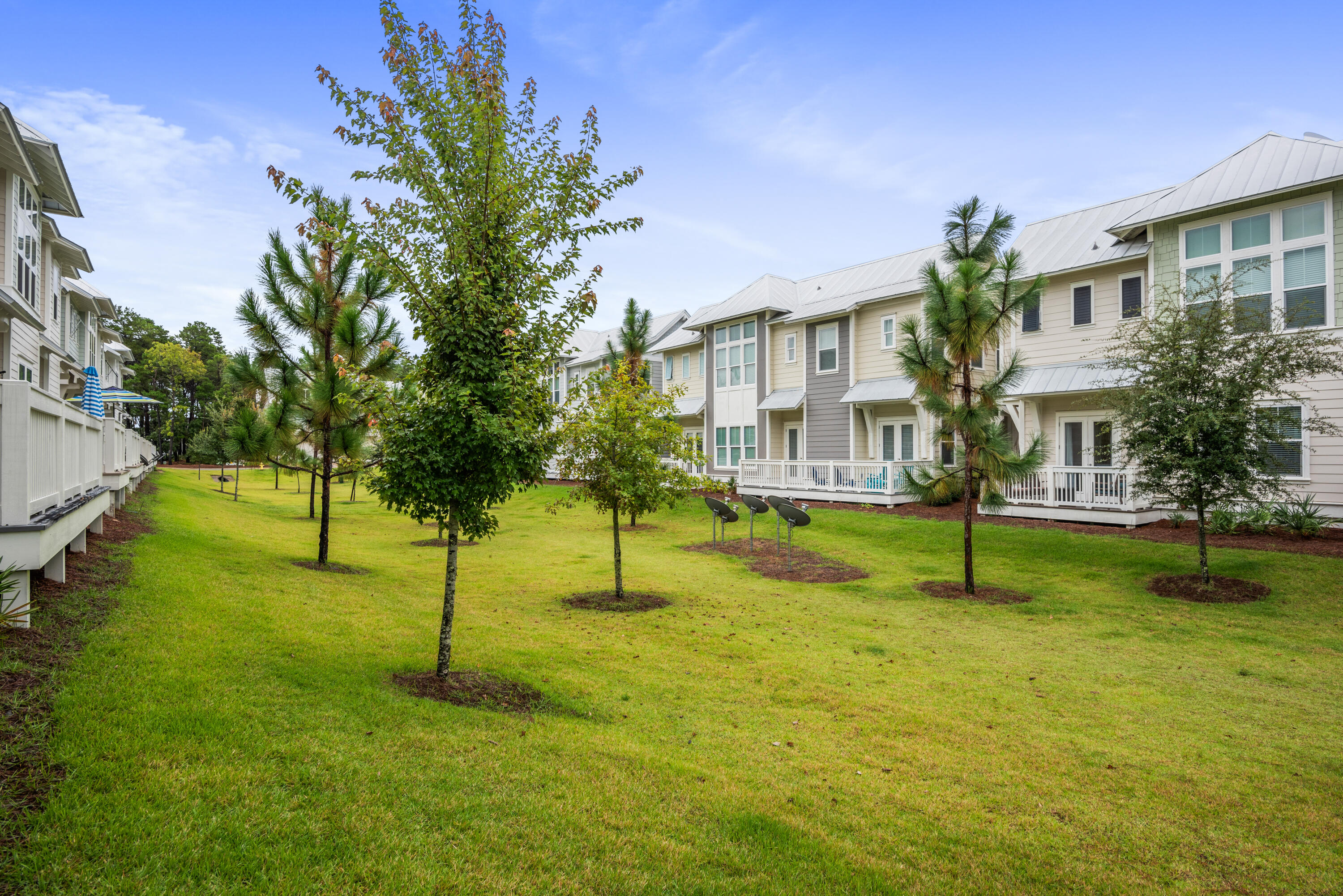 296 Milestone Dr Inlet Beach, Unit B Inlet Beach, FL 32461 - Photo 25 of 47 a view of swimming pool with a yard