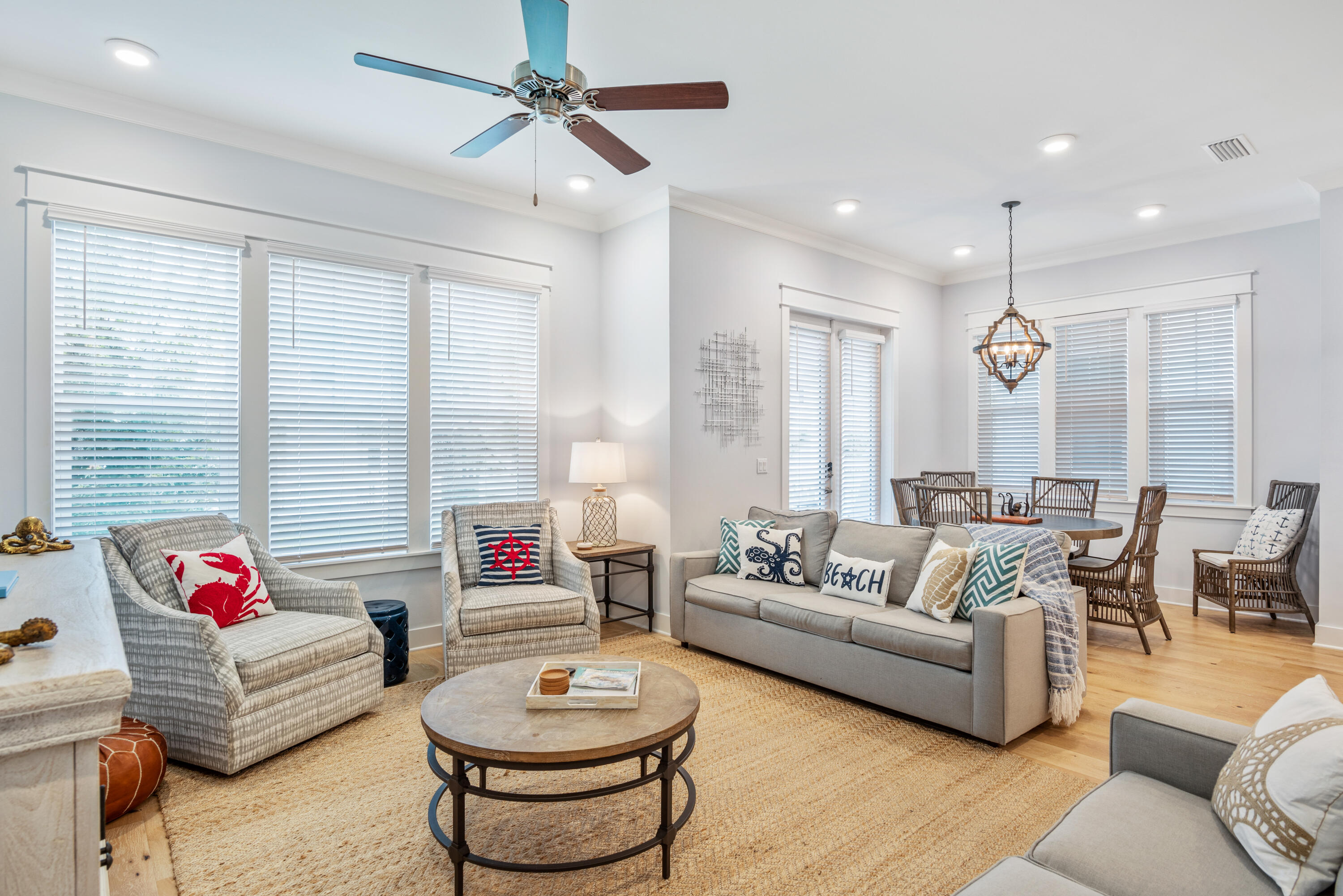 296 Milestone Dr Inlet Beach, Unit B Inlet Beach, FL 32461 - Photo 3 of 47 a living room with furniture and a large window