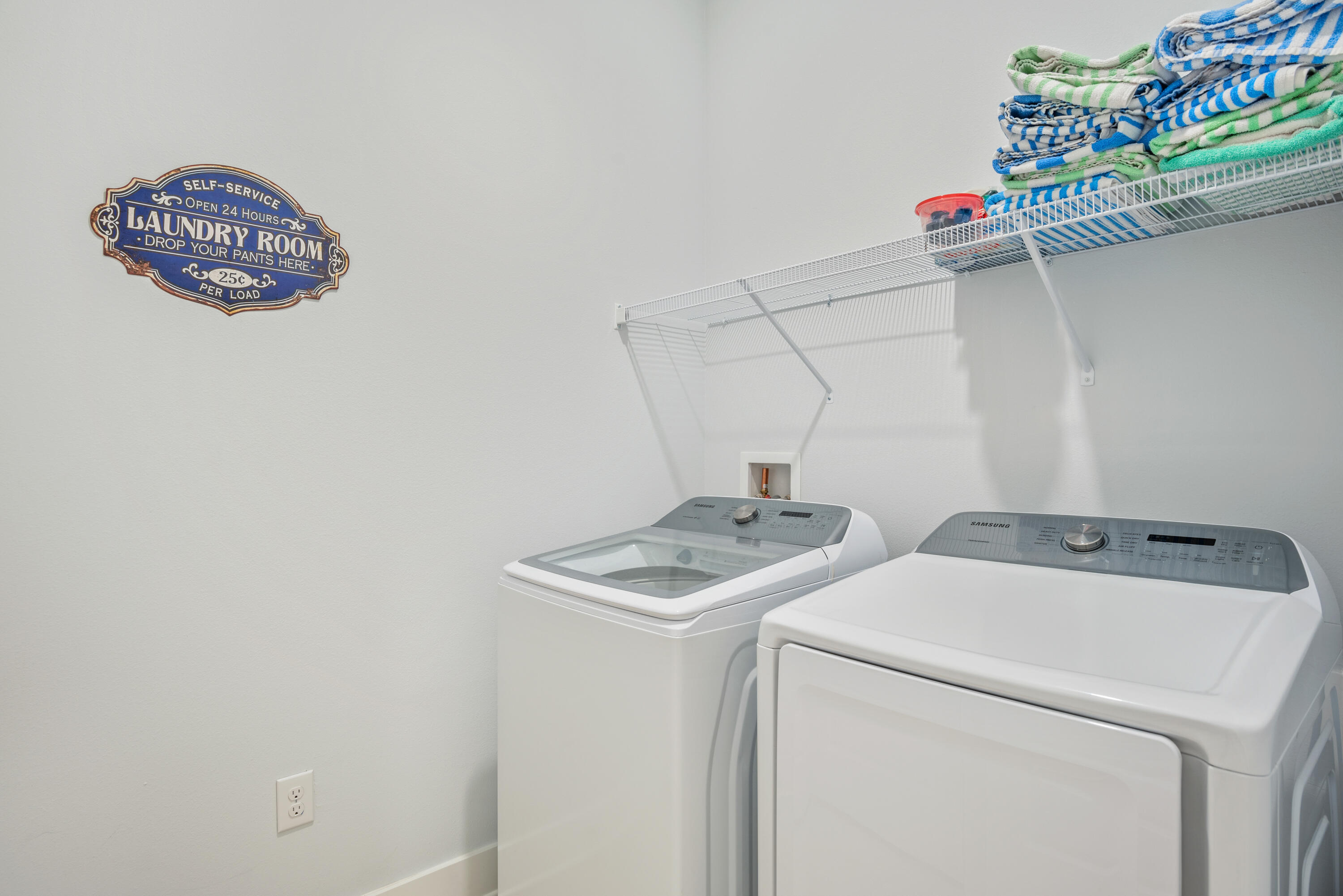 296 Milestone Dr Inlet Beach, Unit B Inlet Beach, FL 32461 - Photo 8 of 47 a utility room with dryer and washer