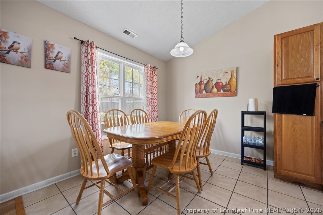 236 Proclamation Drive Raeford, NC 28376 - Photo 22 of 43 a view of a dining room with furniture