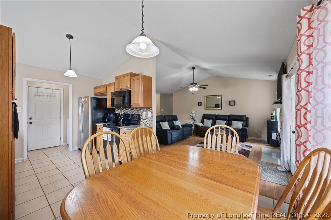236 Proclamation Drive Raeford, NC 28376 - Photo 24 of 43 a view of a dining room with furniture
