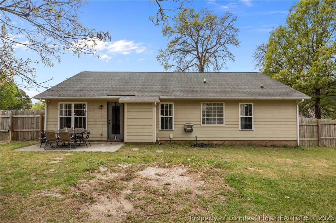 236 Proclamation Drive Raeford, NC 28376 - Photo 32 of 43 a view of a house with a yard