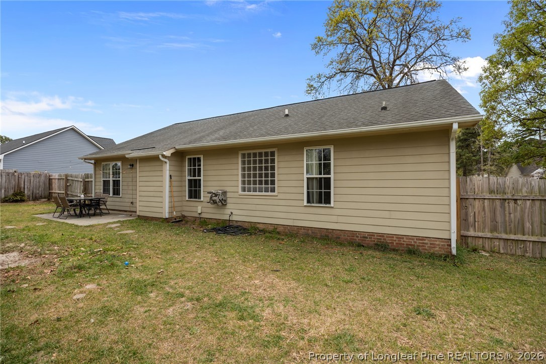 236 Proclamation Drive Raeford, NC 28376 - Photo 33 of 43 a view of a house with a backyard