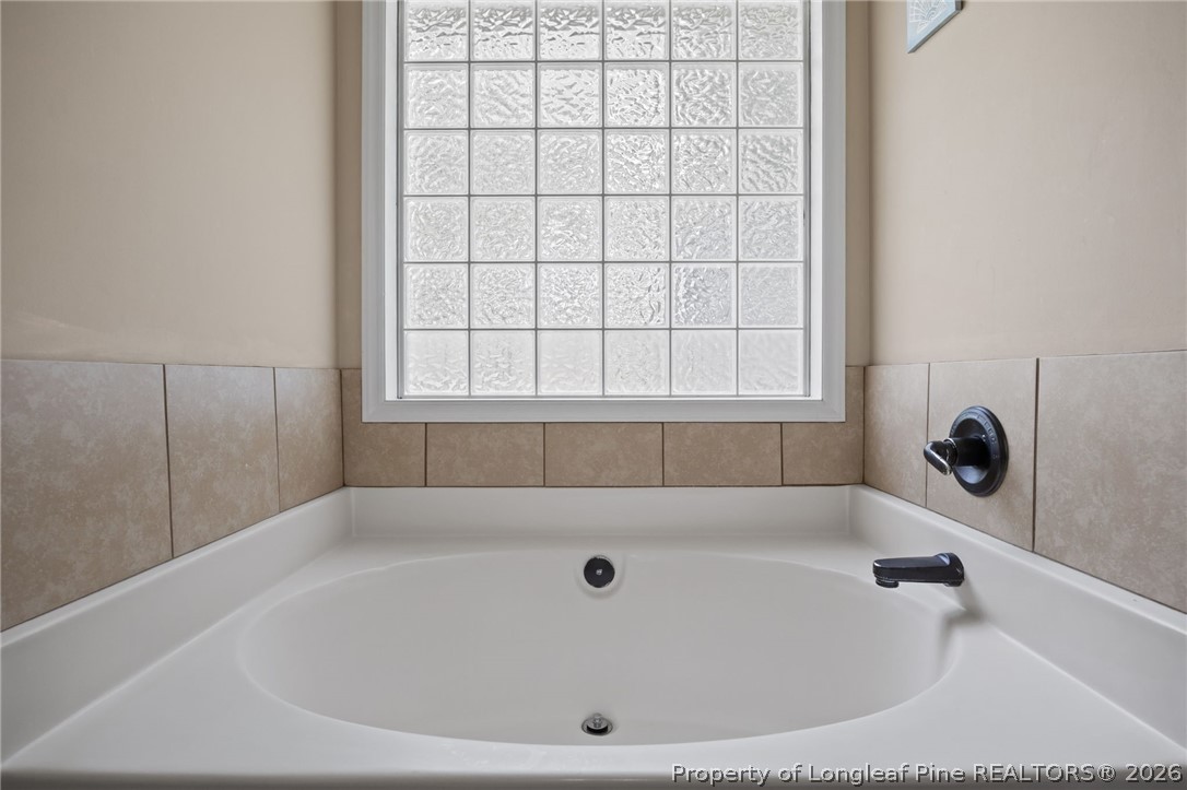 236 Proclamation Drive Raeford, NC 28376 - Photo 5 of 43 a bathroom with a tub