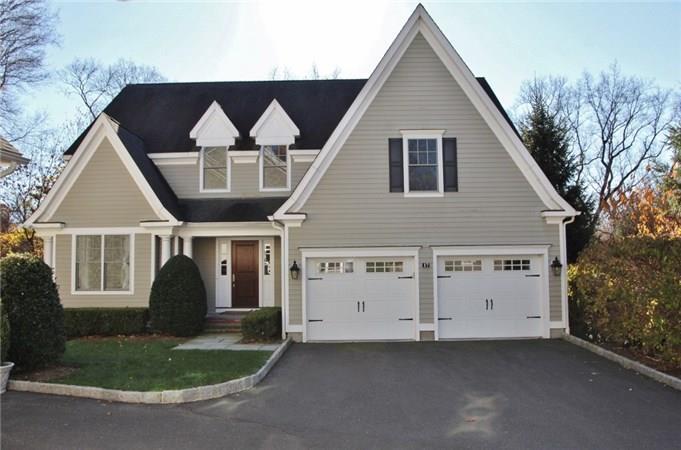 631 Long Ridge Road, Unit 17 Stamford, CT 06902 - Photo 1 of 1 a front view of a house with garage
