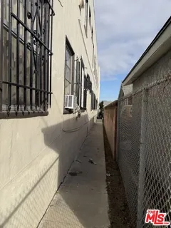 a view of a street with an outdoor seating