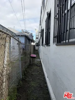 a bathroom with a sink a toilet and a shower