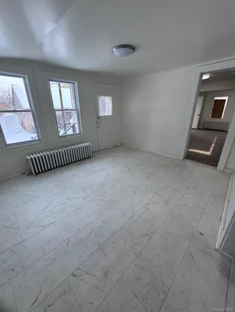 a kitchen with a refrigerator and a sink