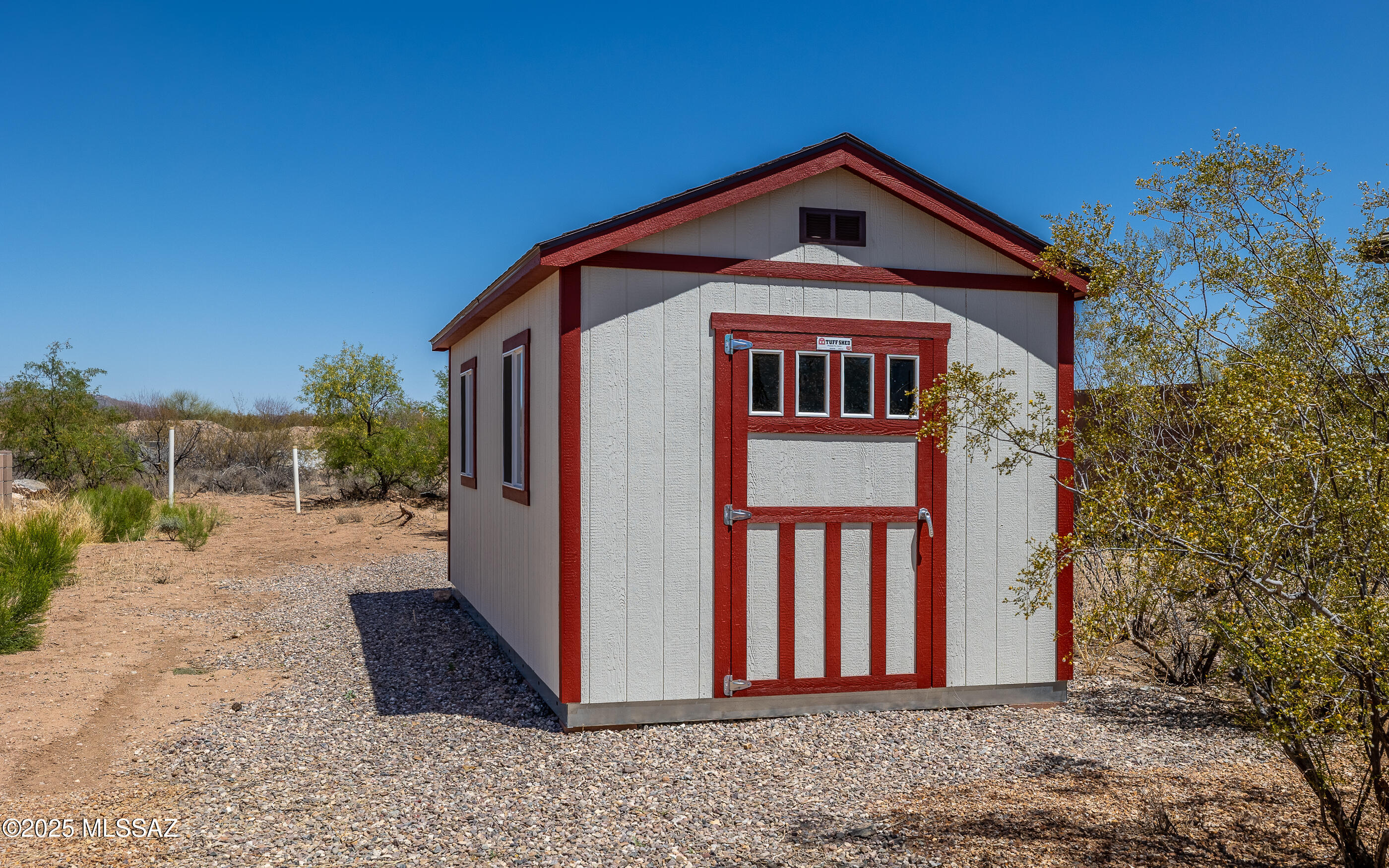 12123 Creosote Valley Road Vail, AZ 85641 - Photo 27 of 46 a front view of a house with a yard
