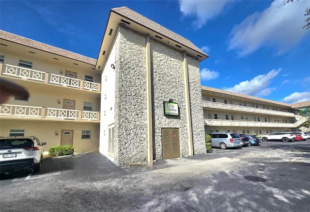 a view of car parked in front of building