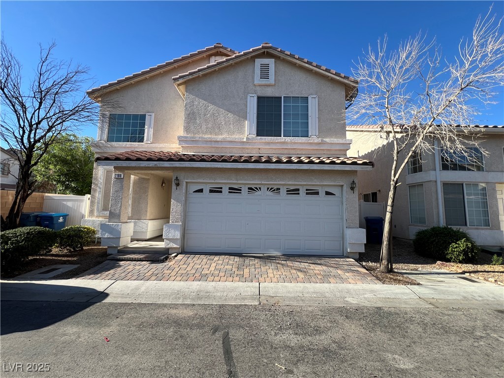 7195 Cestrum Road Las Vegas, NV 89113 - Photo 1 of 33 View of front facade with stucco siding, a tile ro