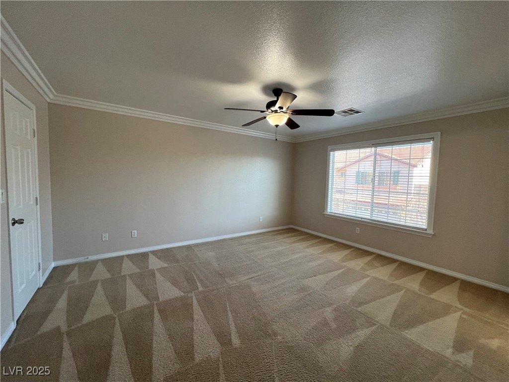 7195 Cestrum Road Las Vegas, NV 89113 - Photo 19 of 33 Unfurnished room with light carpet, baseboards, a