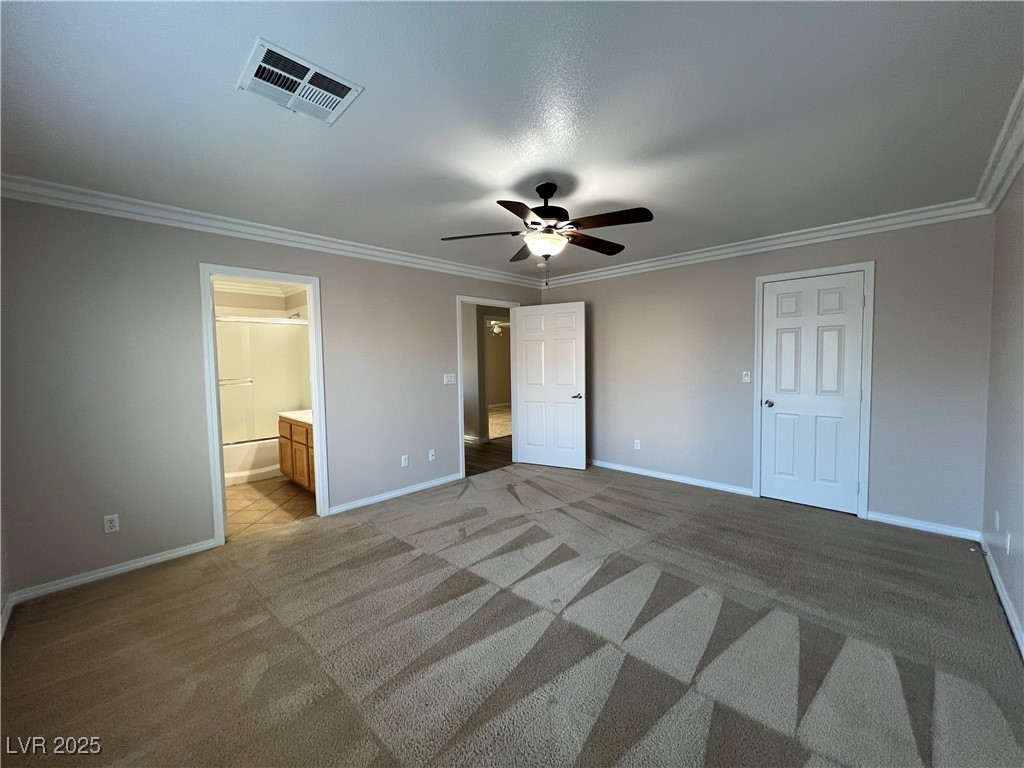 7195 Cestrum Road Las Vegas, NV 89113 - Photo 20 of 33 Unfurnished bedroom featuring baseboards, ornament