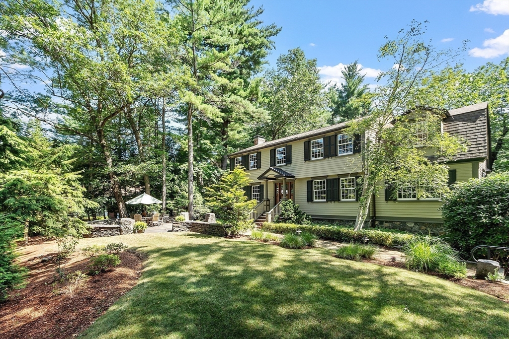 1 Seneca Circle Andover, MA 01810 - Photo 1 of 40 a pathway of a house with a yard