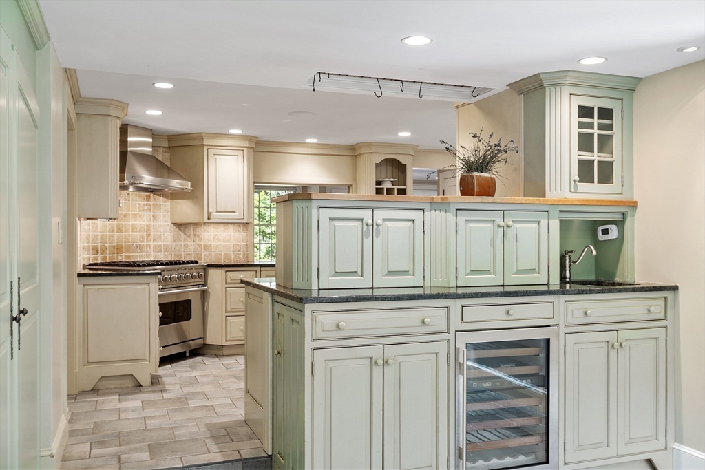 1 Seneca Circle Andover, MA 01810 - Photo 13 of 40 a kitchen with white cabinets and appliances