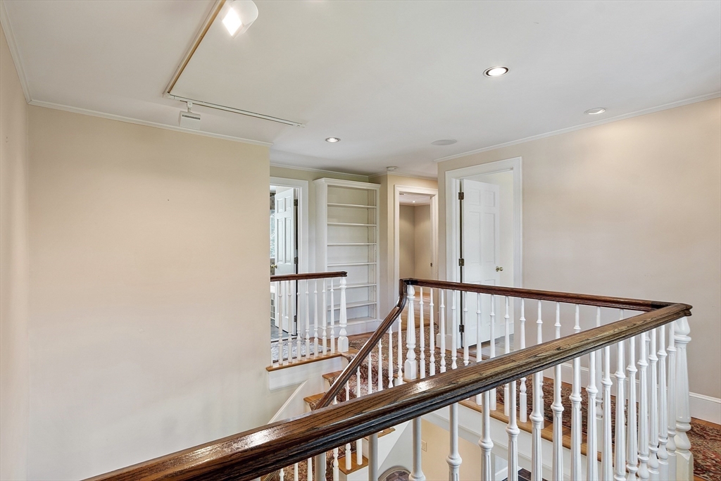 1 Seneca Circle Andover, MA 01810 - Photo 23 of 40 a view of staircase with railing and white walls