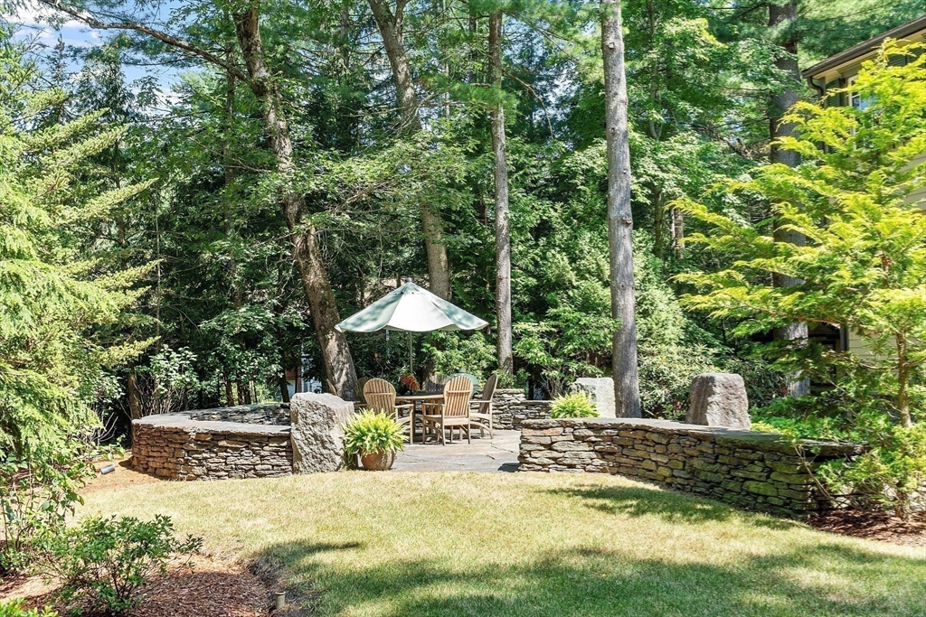 1 Seneca Circle Andover, MA 01810 - Photo 4 of 40 a view of a house with swimming pool and sitting area