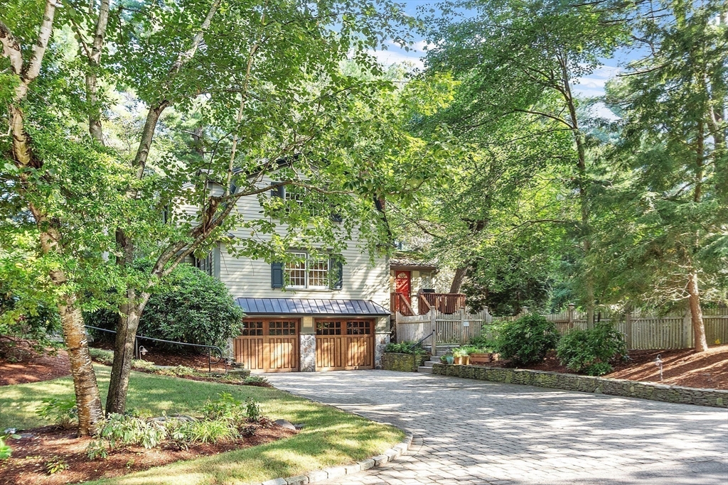 1 Seneca Circle Andover, MA 01810 - Photo 5 of 40 a house that has a tree in front of it