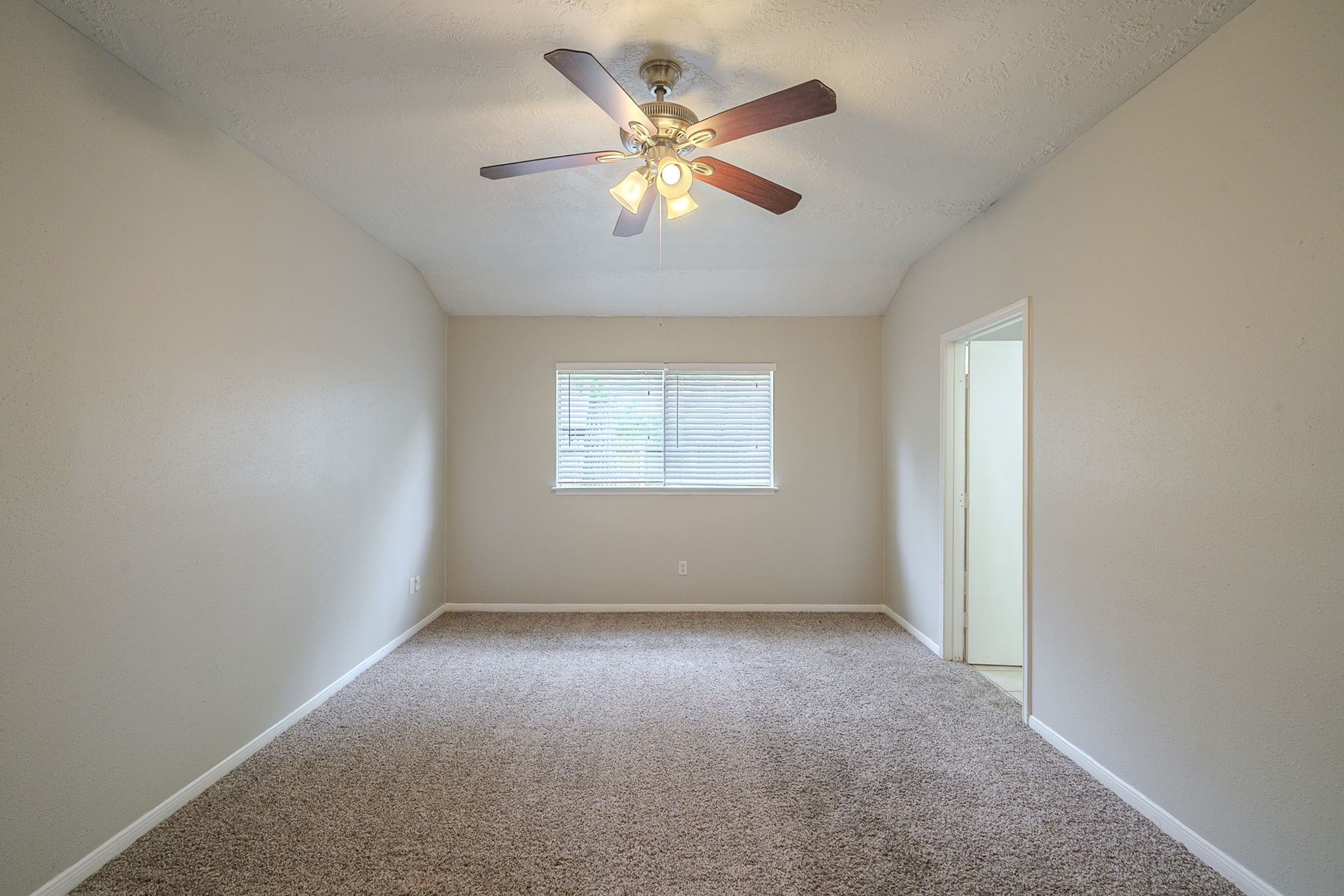 4011 Monteith Drive Spring, TX 77373 - Photo 16 of 28 an empty room with closet and windows