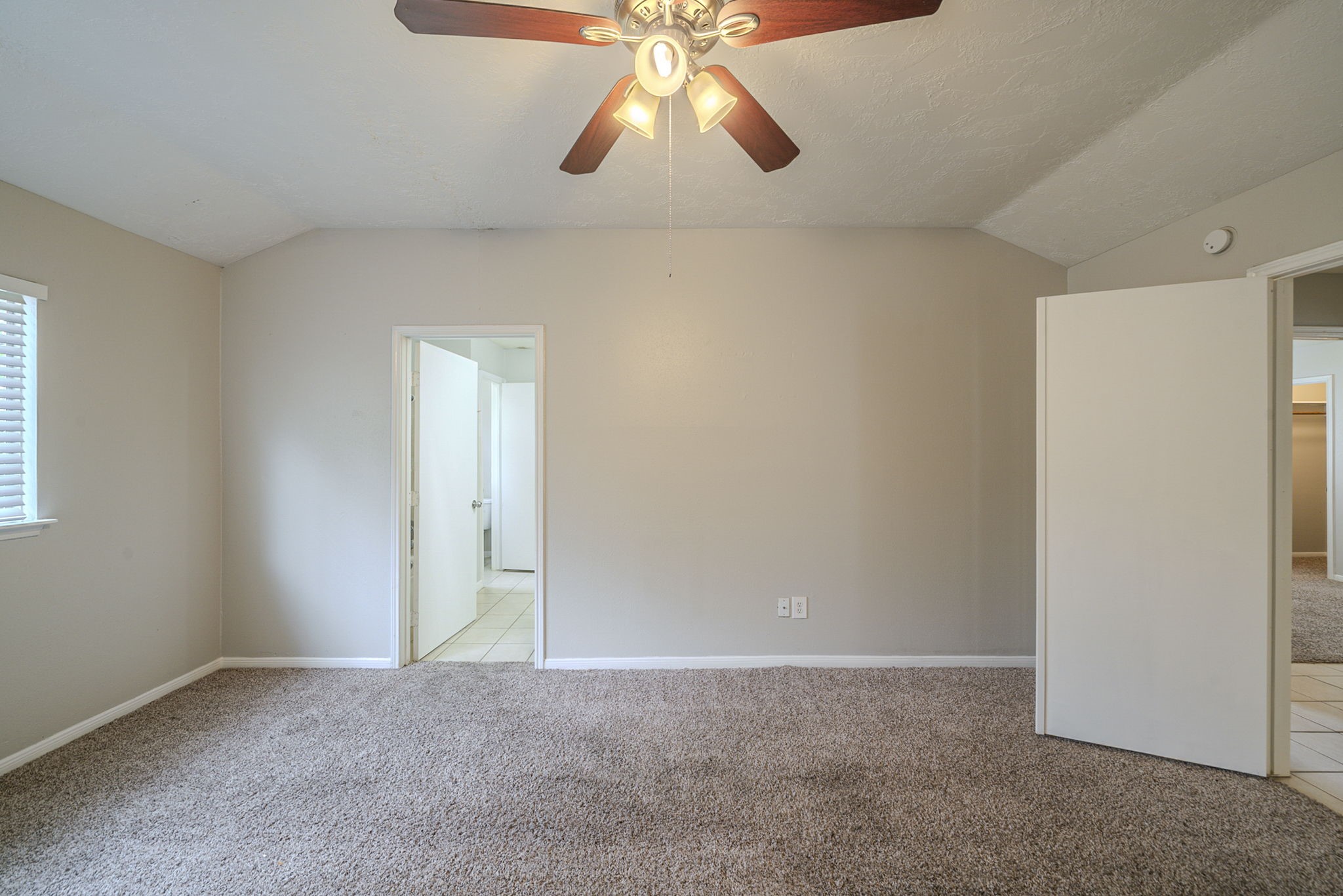 4011 Monteith Drive Spring, TX 77373 - Photo 17 of 28 a view of an empty room and chandelier fan