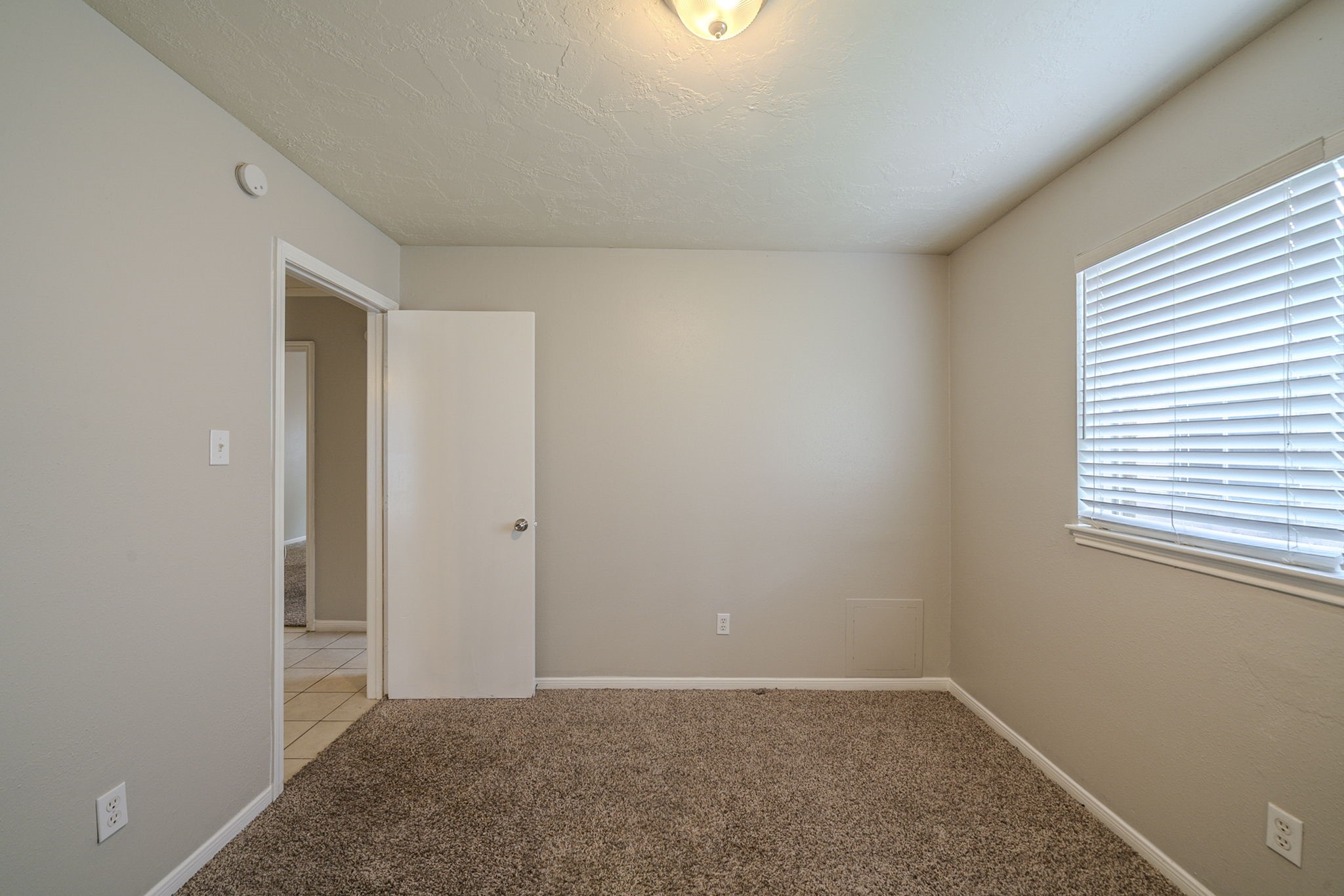 4011 Monteith Drive Spring, TX 77373 - Photo 23 of 28 an empty room with windows